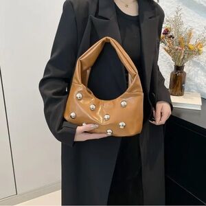 Stylish Tan Women's Bag with Silver Accents